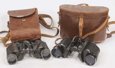 Lot 659 - A pair of Hempenstore 8x32 binoculars, housed...