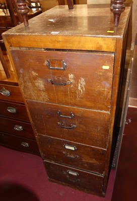 Lot 1300 - A 1930s stained plywood four drawer office...