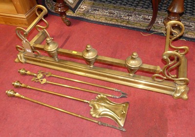 Lot 1309 - A late Victorian brass fire fender, together...