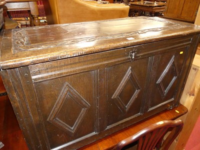 Lot 1313 - An 18th century joined oak and later relief...