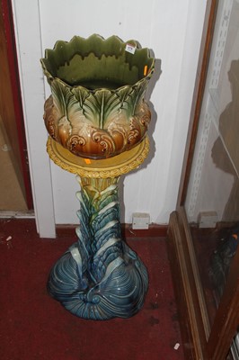 Lot 678 - A Victorian majolica jardiniere and stand, h.94cm