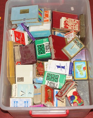 Lot 722 - A collection of vintage playing cards and...