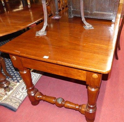 Lot 1317 - A walnut round cornered dining table, raised...