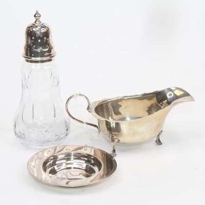 Lot 314 - A George V silver cream jug, together with a...