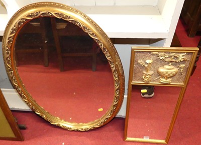 Lot 1333 - A contemporary floral gilt decorated oval wall...