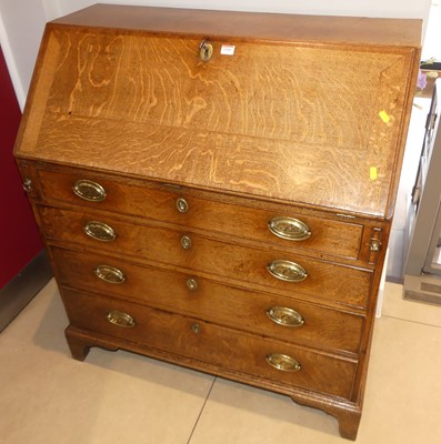 Lot 1350 - An early 19th century provincial oak and...