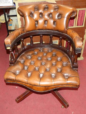 Lot 1378 - A contemporary mahogany and tan leather...