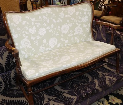 Lot 1388 - An Edwardian beech two-seater salon settee,...