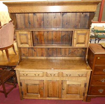 Lot 1365 - A joined oak Welsh dresser, having two-tier...