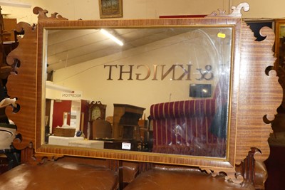 Lot 1370 - A mahogany fret-cut rectangular wall mirror in...