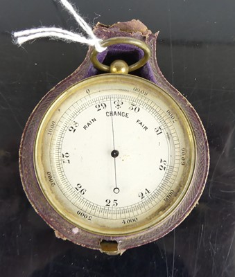 Lot 375 - A brass cased pocket barometer, having...