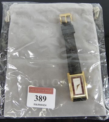 Lot 389 - A lady's Gucci quartz tank wristwatch, gilt...