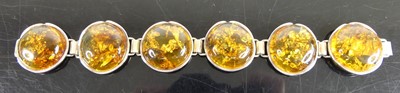 Lot 392 - A contemporary silver and clear amber set...