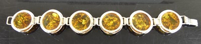 Lot 392 - A contemporary silver and clear amber set...