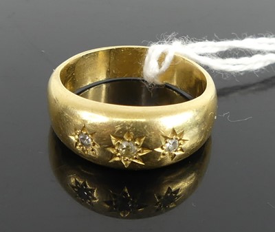 Lot 402 - A yellow metal diamond ring, 'gypsy' set with...