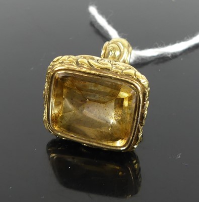 Lot 408 - A Victorian gilt metal and citrine set fob...