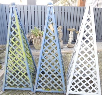 Lot 1470 - Three painted garden timber obelisks, each...