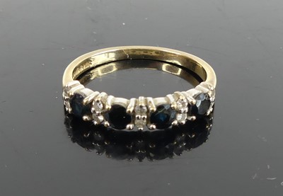 Lot 418 - A 9ct gold, sapphire and diamond point set...