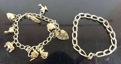 Lot 424 - A 9ct gold curblink bracelet containing...