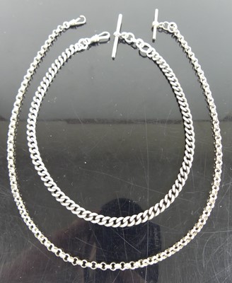 Lot 426 - A silver curblink watch chain with Albert,...