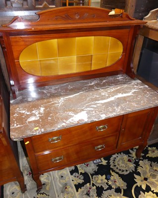 Lot 1417 - An Edwardian walnut variegated marble topped...