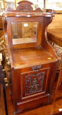 Lot 1429 - A late Victorian relief carved walnut mirror...