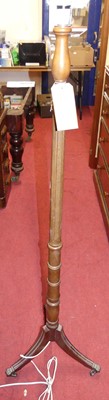 Lot 1436 - A contemporary turned and fluted standard lamp...