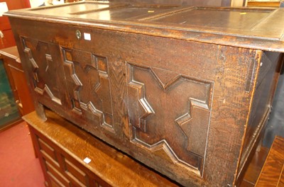 Lot 1443 - An 18th century joined oak three panelled...