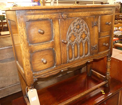 Lot 1446 - A small Ipswich joined oak side cupboard,...