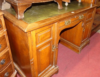 Lot 1450 - A late Victorian walnut kneehole writing desk,...