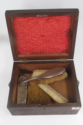 Lot 298 - A Silver clad dressing table brush set,...