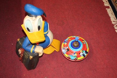 Lot 1568 - A resin figure of Donald Duck, together with a...