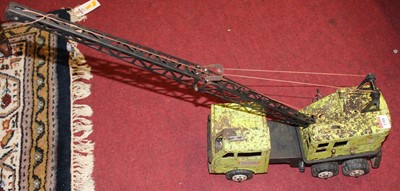 Lot 1588 - A playworn tin plate and plastic heavy duty crane