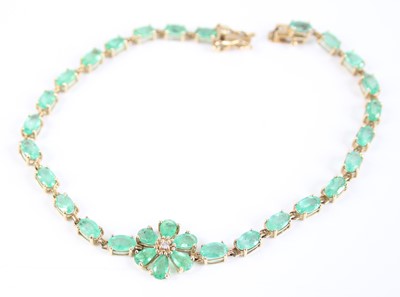 Lot 2600 - A 9ct yellow gold emerald multi-stone bracelet,...