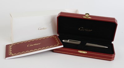 Lot 2339 - A cased Cartier Diabolo ballpoint pen, in...