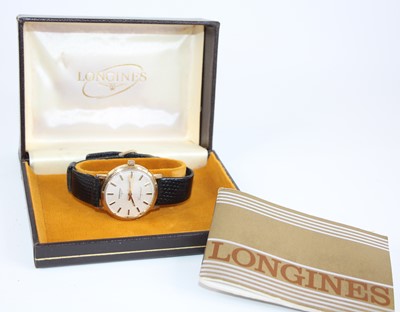 Lot 2611 - A bi-metal Longines Conquest manual wind...