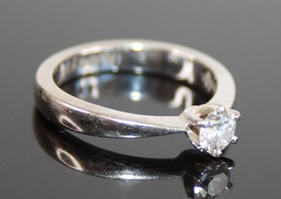 Lot 2647 - An 18ct white gold diamond solitaire ring,...