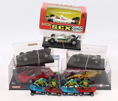 Lot 2086 - A tray containing Scalextric-related boxed...