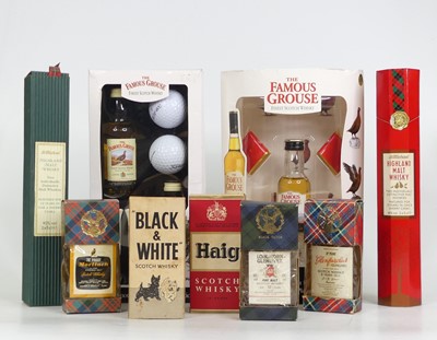 Lot 1518 - Two boxes containing assorted whisky spirit...