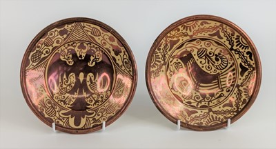 Lot 2101 - A pair of Hispano-Moresque copper lustre...