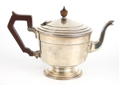 Lot 75 - An Art Deco silver teapot, of squat circular...