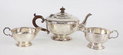Lot 77 - An Art Deco silver three-piece tea set,...