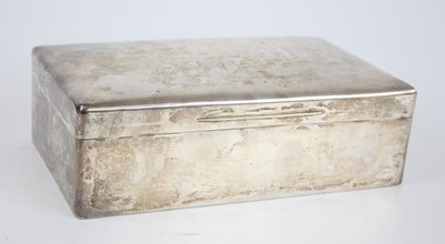 Lot 76 - An Art Deco silver table cigar box, of rounded...