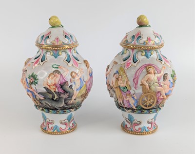 Lot 2111 - A pair of Naples porcelain vases and covers,...