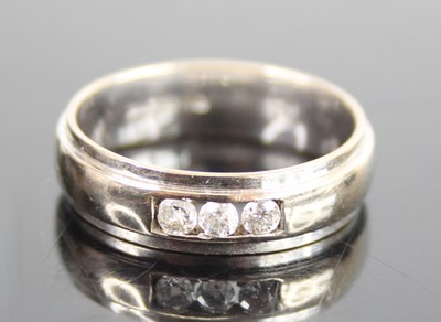 Lot 2651 - A 9ct white gold 5.5mm diamond set D-shaped...