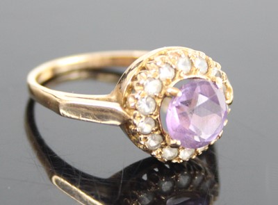 Lot 2654 - A 9ct yellow gold, amethyst and topaz circular...