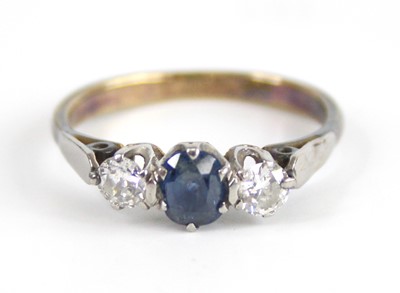 Lot 2656 - A yellow and white metal, sapphire and diamond...