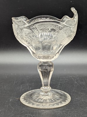 Lot 2134 - A cut and etched glass pedestal open table...