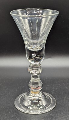 Lot 2127 - A wine glass, circa 1730, having a bell bowl...