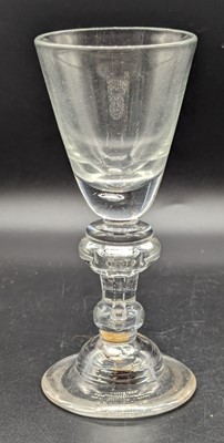 Lot 2128 - A wine glass, circa 1730, having a round...